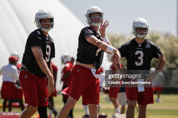 Arizona Cardinals quarterback Sam Bradford , Arizona Cardinals quarterback Mike Glennon , and Arizona Cardinals quarterback Josh Rosen run through a...