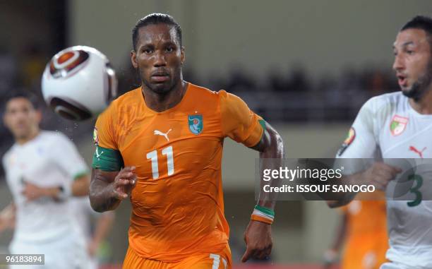 Ivory Coast striker and team captain Didier Drogba chases the ball on January 24, 2010 at the Chiazi stadium in Cabinda during their quarter final...