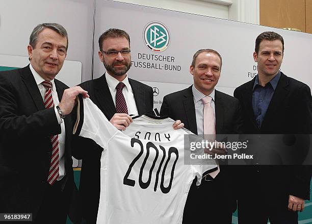 Wolfgang Niersbach, general secretary of German football association, Sony Germany's Managing Director, Jeffry van Ede, Sony Germany's Commercial...