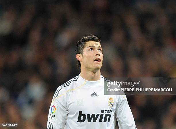 Real Madrid's Portuguese forward Cristiano Ronaldo plays against Malaga during their Spanish League football match at Santiago Bernabeu stadium in...