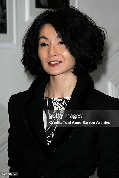 Maggie Cheung poses as she arrives at the Christian Dior Haute-Couture show as part of the Paris Fashion Week Spring/Summer 2010 on January 25, 2010...