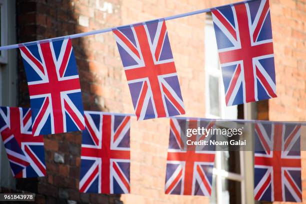 Flags are seen outside the wedding of Prince Harry to Ms. Meghan Markle at Windsor Castle on May 19, 2018 in Windsor, England. Prince Henry Charles...