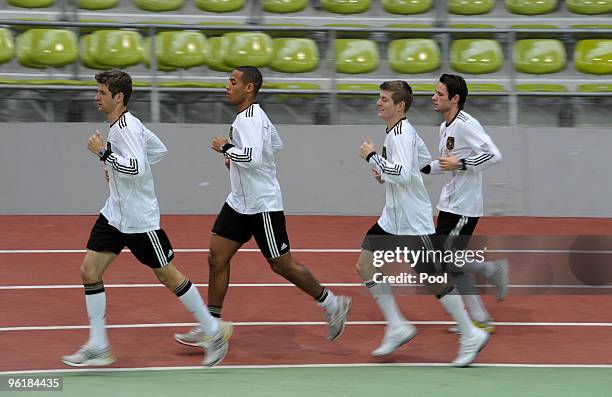 Thomas Mueller, Dennis Aogo, Toni Kroos and Christian Traesch of the German national football team are seen during a fitness test at the Glaspalast...