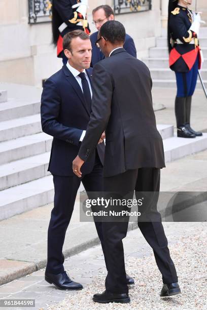 French President Emmanuel Macron welcomes the President of Rwanda Paul Kagame for a meeting at Elysee Palace on May 23, 2018 in Paris, France. Since...