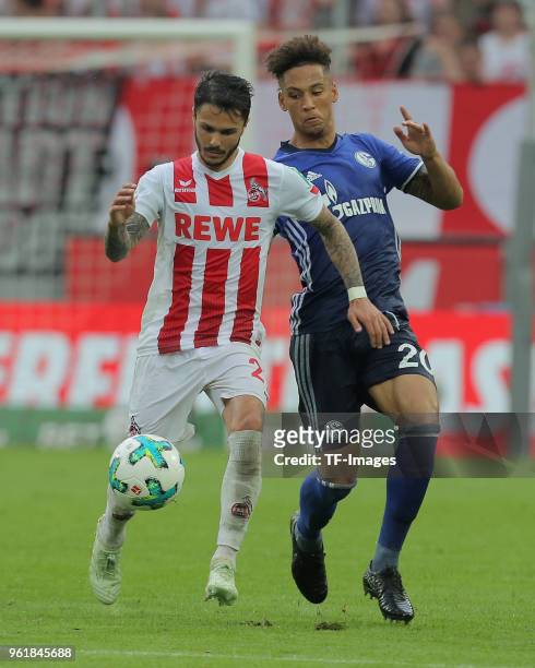 Leonardo Bittencourt of Koeln and Thilo Kehrer of Schalke battle for the ball during the Bundesliga match between 1. FC Koeln and FC Schalke 04 at...