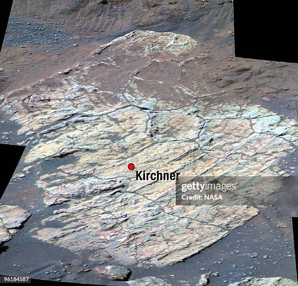 This false-color image taken by NASA's Mars Exploration Rover Opportunity shows a rock dubbed "Escher" on the southwestern slopes of "Endurance...