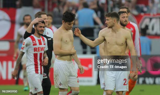 Leonardo Bittencourt of Koeln, Jorge Mere of Koeln and Salih Oezcan look dejected during the Bundesliga match between 1. FC Koeln and FC Schalke 04...