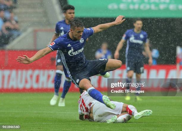 Franco Matias Di Santo of Schalke and Leonardo Bittencourt of Koeln controls the ball during the Bundesliga match between 1. FC Koeln and FC Schalke...