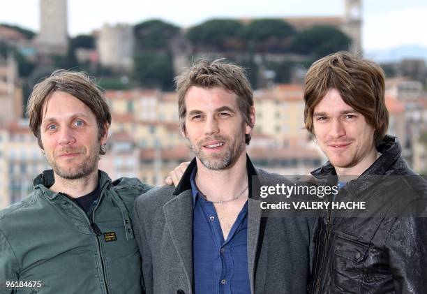 Members of "The Black swan effect" band Gareth Hale, Dominic Greensmith and Jesse Wood pose during a photocall on January 26, 2010 in Cannes,...