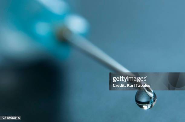 a macro of a needle - needle stock pictures, royalty-free photos & images