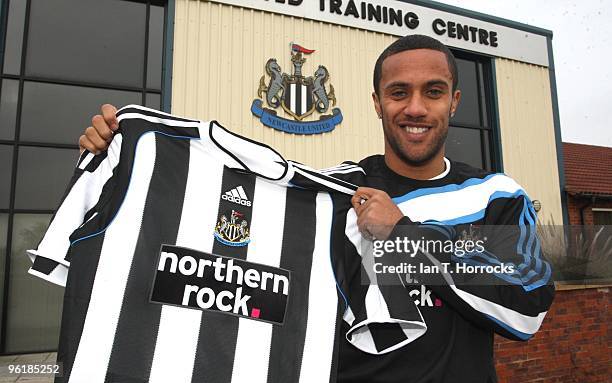 Wayne Routledge poses with his new team shirt at Newcastle United's training ground after signing for Newcastle United from Queens Park Rangers on...