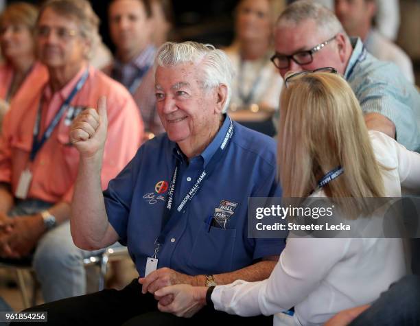 Hall of fame member Bobby Allison learns that his son, Davey Allison, is voted into the Hall of Fame during the NACAR Hall of Fame Voting Day at...