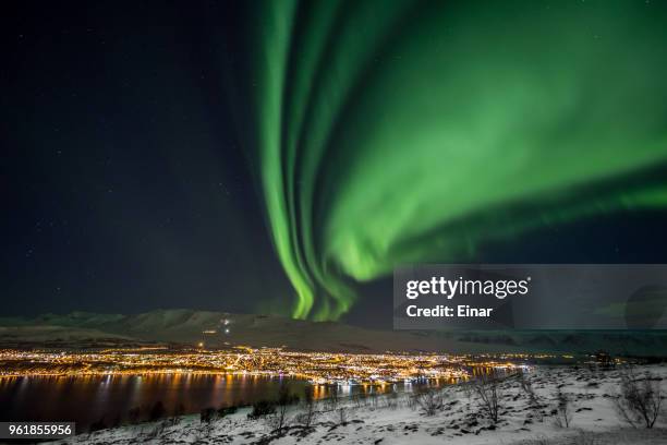 northern lights in eyjafjordur iceland - akureyri stock-fotos und bilder