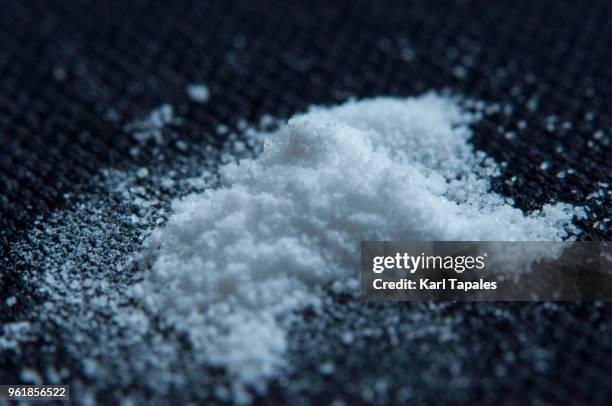 a white powder concept of cocaine - heroin stock-fotos und bilder