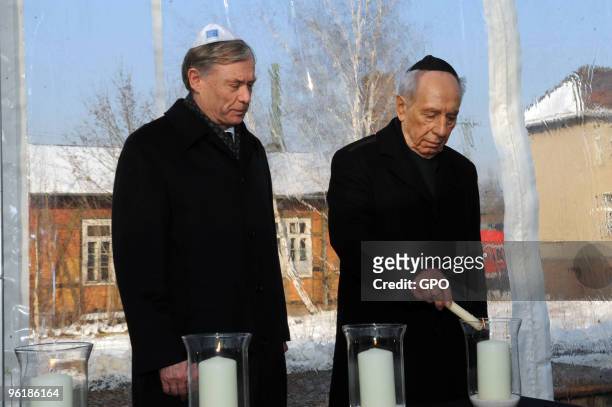 In this handout image supplied by the Israeli Government Press Office , German President Horst Koehler Israeli President Shimon Peres commemorate at...