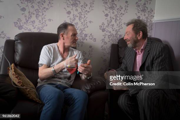 Former international footballer Paul 'Gazza' Gascoigne chatting to Dr Peter Willis, whilst undergoing a nutrient infusion at Cassiobury Court, a drug...