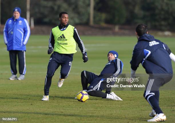 Daniel Sturridge and Deco of Chelsea in action during a training session at the Cobham Training ground on January 26, 2010 in Cobham, England.