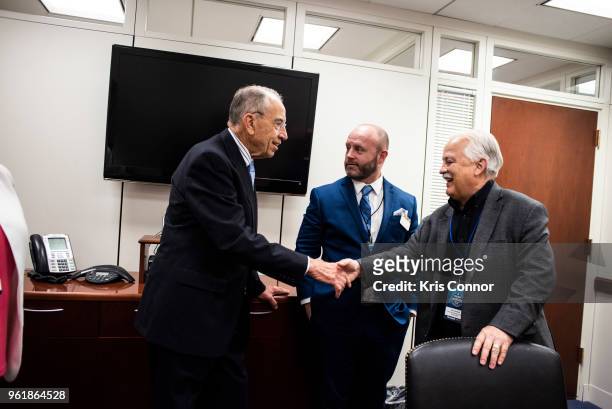 National Association of Music Merchant volunteer Robin Walenta with members speak with Sen. Chuck Grassley during Save The Music Foundation Day Of...