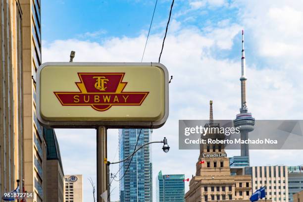 entrance to the ttc subway sign in university avenue, toronto, canada - ttc stock pictures, royalty-free photos & images