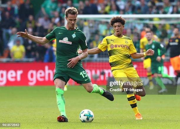 Sebastian Langkamp of Bremen and Jadon Malik Sancho of Dortmund battle for the ball during the Bundesliga match between SV Werder Bremen and Borussia...