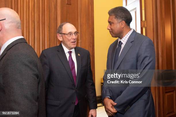 Representative David Roe and baseball legend and musician Bernie Williams attend a reception during Save The Music Foundation Day Of Music Education...