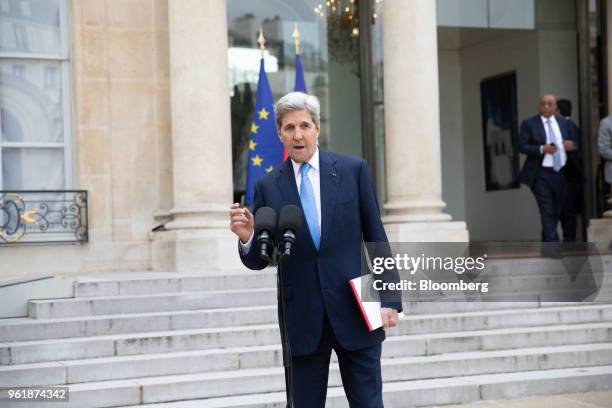 John Kerry, former U.S. Secretary of State, speaks to the media in the courtyard of Elysee Palace after leaving Tech For Good meeting at Elysee...