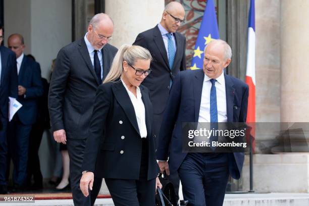 Stephane Richard, chief executive officer of Orange SA, from left, Angela Ahrendts, senior vice president of retail at Apple Inc., Satya Nadella,...