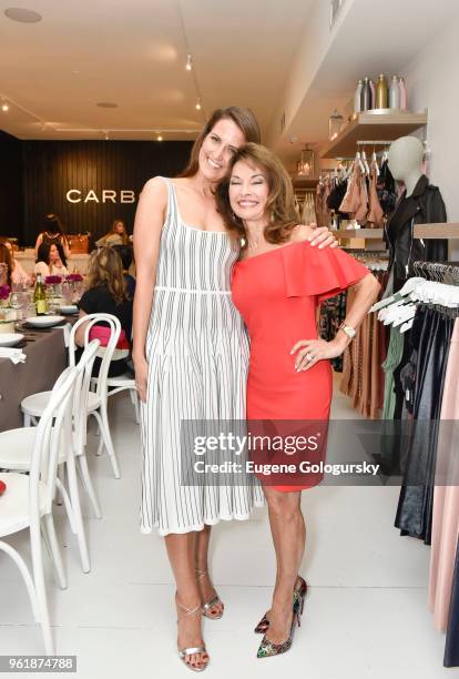 Katie Warner Johnson and Susan Lucci attend the Carbon 38 And Hamptons Magazine Private Dinner on May 23, 2018 in Bridgehampton, New York.