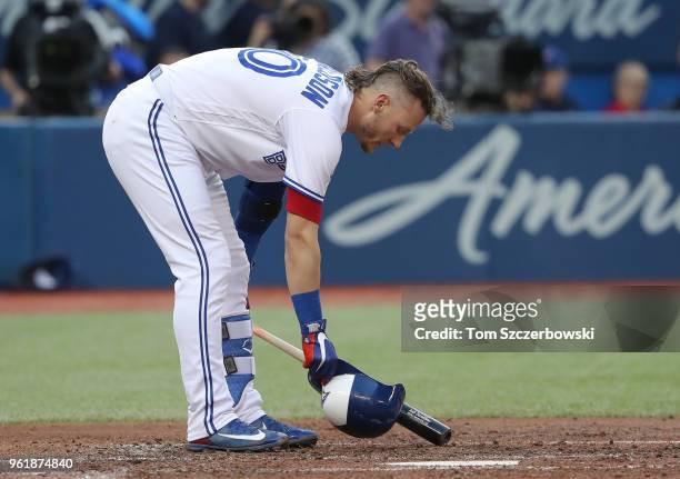Josh Donaldson of the Toronto Blue Jays reacts after being called out on strikes in the third inning during MLB game action against the Los Angeles...