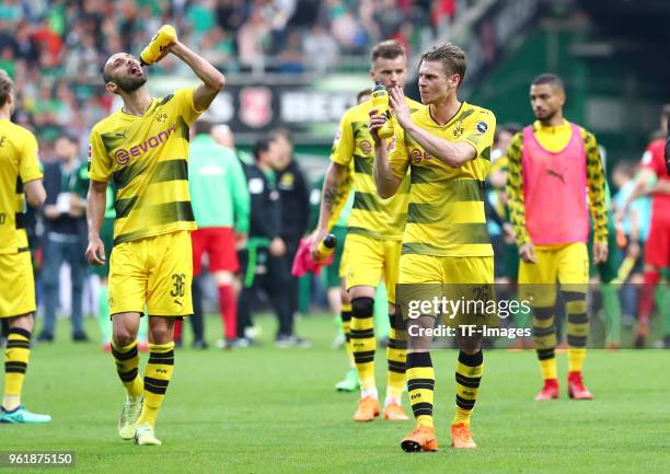 Oemer Toprak of Dortmund, Andrey Yarmolenko of Dortmund, Lukasz Piszczek of Dortmund look dejected after the Bundesliga match between SV Werder...