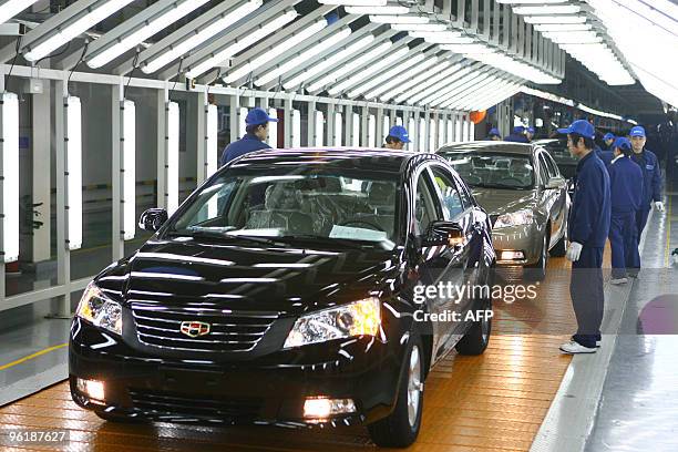 Workers assemble the cars at a Gelly Autommobile factory that may produce Volvo cars in the future, in Ningbo, east China's Zhejiang province on...