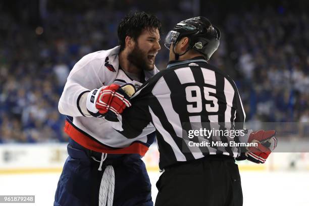 Tom Wilson of the Washington Capitals argues with linesman Jonny Murray during the first period in Game Seven of the Eastern Conference Finals during...