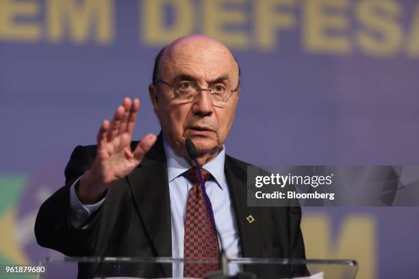 Henrique Meirelles, presidential candidate for the Brazilian Democratic Movement , gestures while speaking during a National Confederation of...