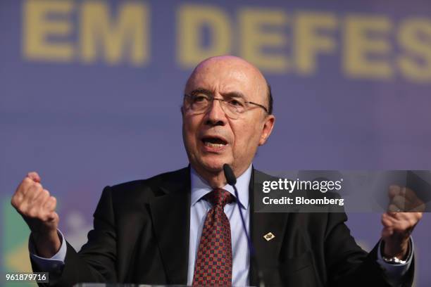 Henrique Meirelles, presidential candidate for the Brazilian Democratic Movement , gestures while speaking during a National Confederation of...