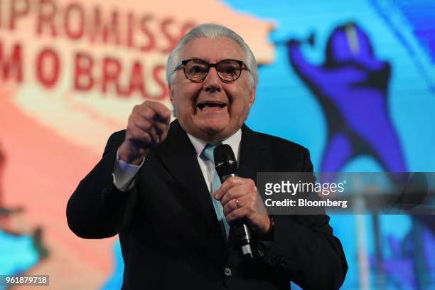 Guilherme Afif Domingos, presidential candidate for the Social Democratic Party , gestures while speaking during a National Confederation of...