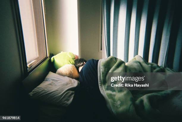 A man sleeping in bed