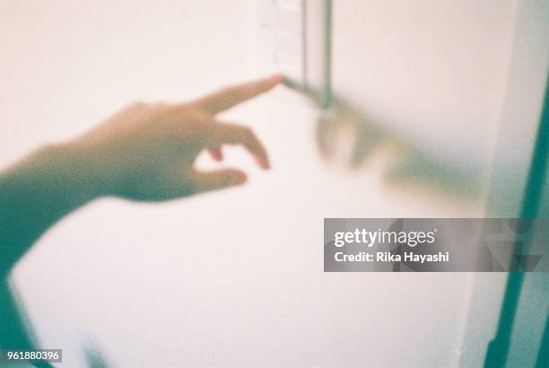 push the switch with your finger - electrical switch stock pictures, royalty-free photos & images