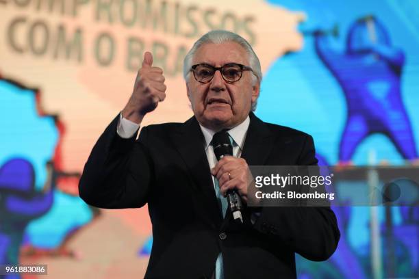 Guilherme Afif Domingos, presidential candidate for the Social Democratic Party , gestures while speaking during a National Confederation of...