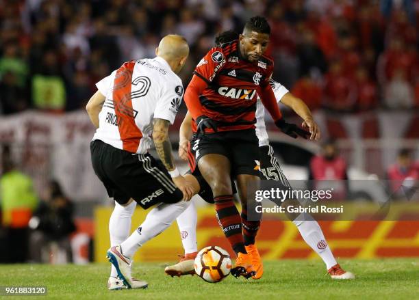 Rodinei of Flamengo fights for the ball with Javier Pinola of River Plate during a match between River Plate and Flamengo as part of Copa CONMEBOL...