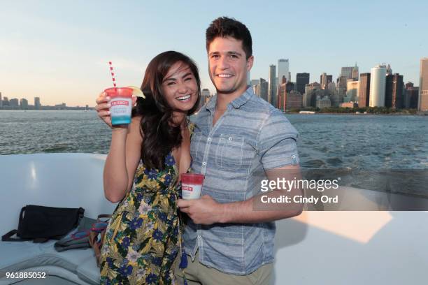 The Bachelor" alum Caila Quinn and Nick Burrello attend the Smirnoff Red, White & Berry Boat Party on May 23, 2018 in New York City.