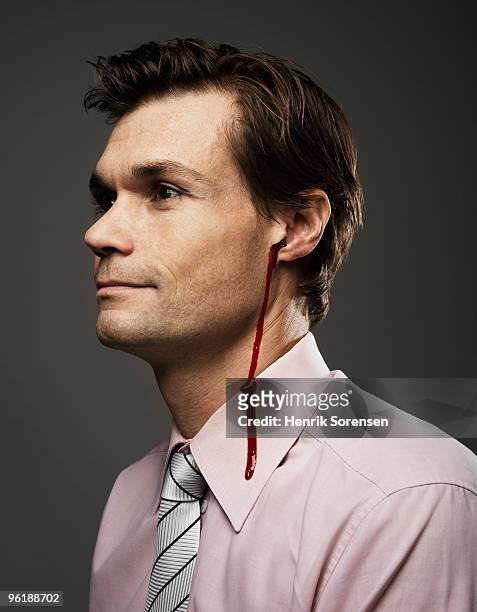 adult male with blood trickling down from ear - människoöra bildbanksfoton och bilder