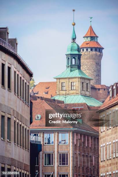 view on tower of the nuremberg castle from an alley below. - nuremberg stock pictures, royalty-free photos & images