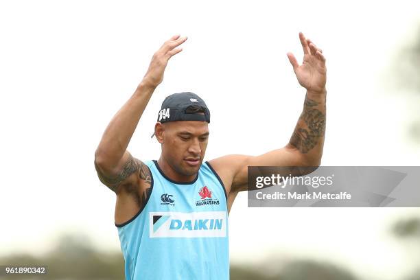 Israel Folau stretches during a Waratahs Super Rugby training session at David Phillips Sports Complex on May 24, 2018 in Sydney, Australia.