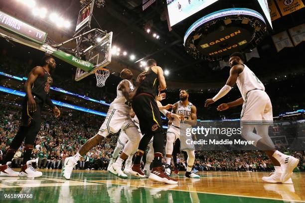 Marcus Morris and Terry Rozier of the Boston Celtics get into an altercation with Larry Nance Jr. #22 of the Cleveland Cavaliers in the first half...