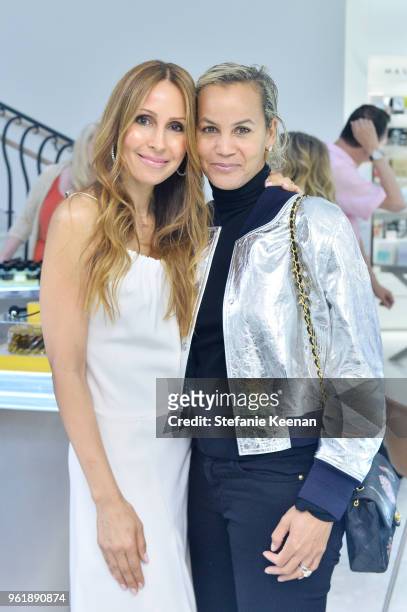 Isabel Madison and Erica Reid attend Barneys New York Celebrates the Farrah Fawcett Foundation at Barneys New York Beverly Hills on May 23, 2018 in...
