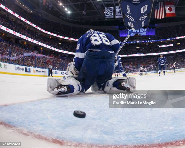 Goalie Andrei Vasilevskiy of the Tampa Bay Lightning gives up a goal to Andre Burakovsky of the Washington Capitals during Game Seven of the Eastern...