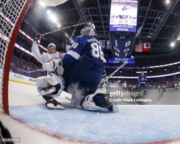 Goalie Andrei Vasilevskiy of the Tampa Bay Lightning gives up a goal to Andre Burakovsky of the Washington Capitals during Game Seven of the Eastern...