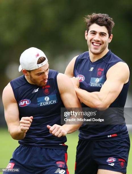 Jack Viney of the Demons and Christian Petracca play around during a Melbourne Demons AFL training session at Gosch's Paddock on May 24, 2018 in...