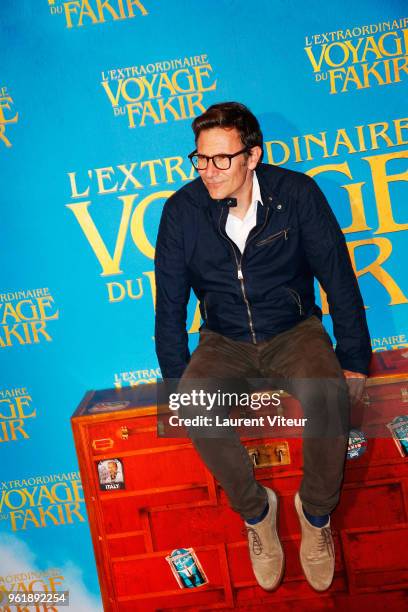 Michel Hazanavicius attends "L'Extraordinaire Voyage du Fakir" Paris Premiere at Publicis Champs Elysees on May 23, 2018 in Paris, France.