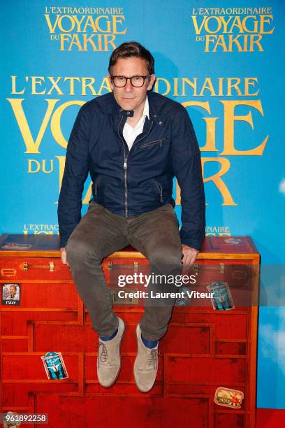 Michel Hazanavicius attends "L'Extraordinaire Voyage du Fakir" Paris Premiere at Publicis Champs Elysees on May 23, 2018 in Paris, France.